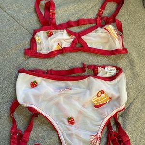 Solstice Intimates Strawberry Shortcake Large Never Worn. Leg pieces lil tangled